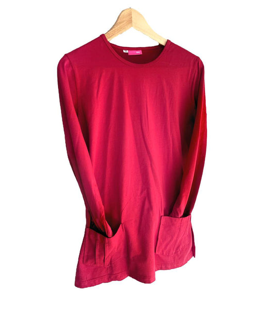 Red long-sleeve shirt on a wooden hanger against a white background