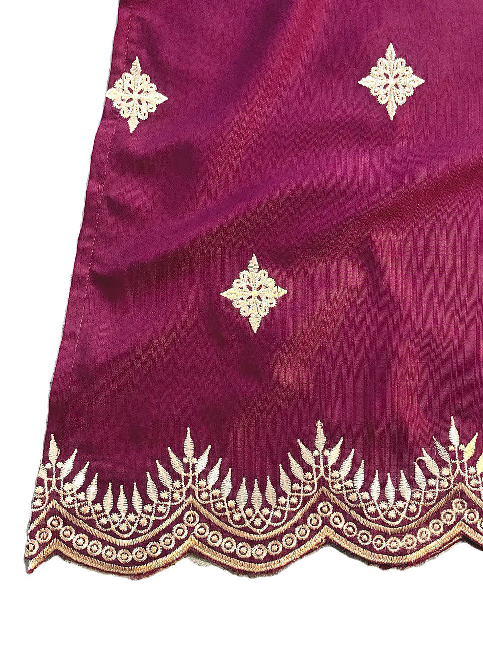 Close-up of Purple blouse with gold floral embroidery