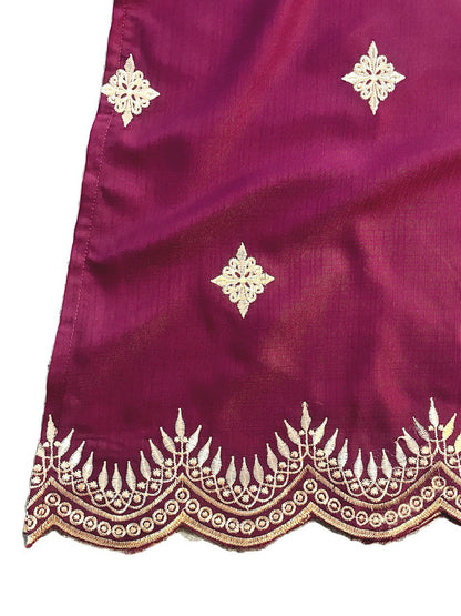 Close-up of Purple blouse with gold floral embroidery