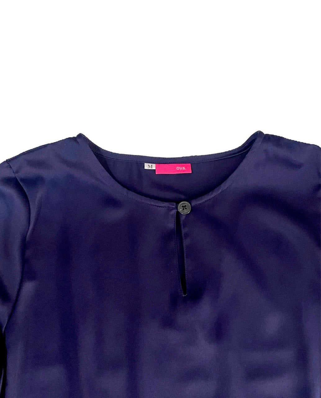 Close up of dark blue blouse neckline