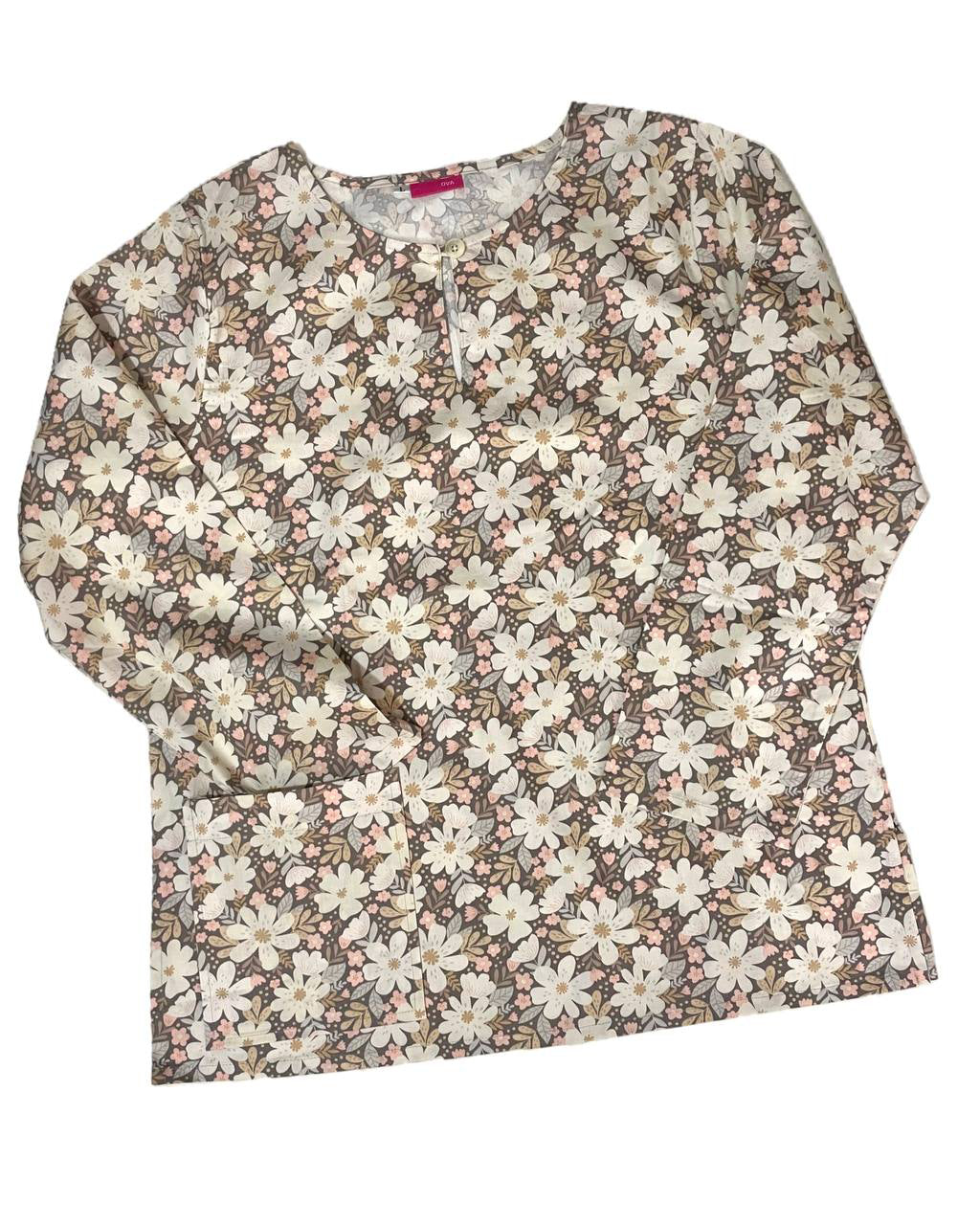 Floral patterned blouse on a white background