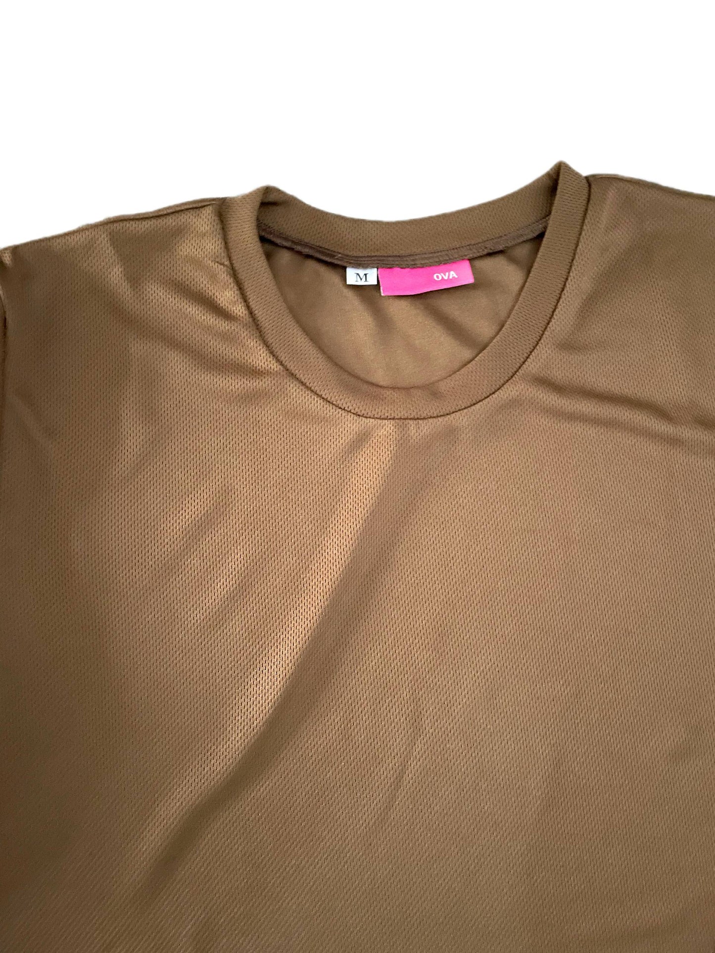 Brown t-shirt with a visible brand tag on a white background