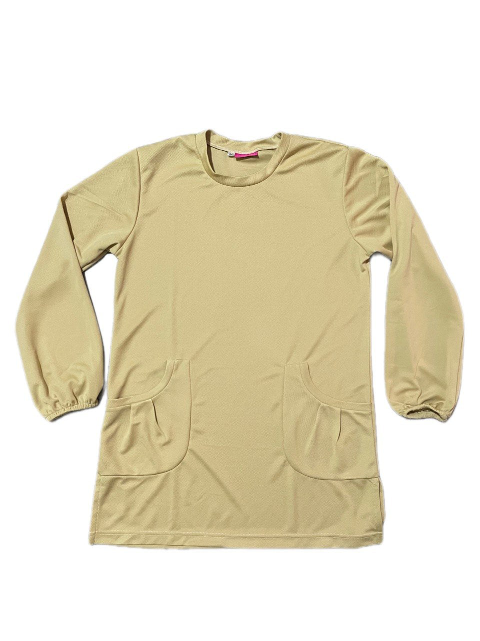 Beige long-sleeve dry fit shirt with front pocket on a white background