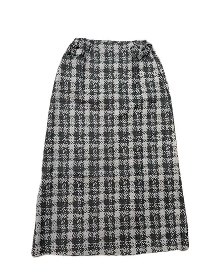 Black and dark gray checkered skirt on a white background