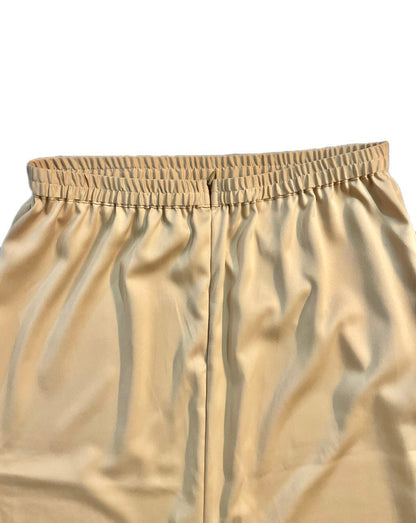 Close-up of back skirt brown with an elastic waistband on a white background